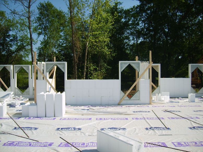 Partially completed ICF walls with window bucks