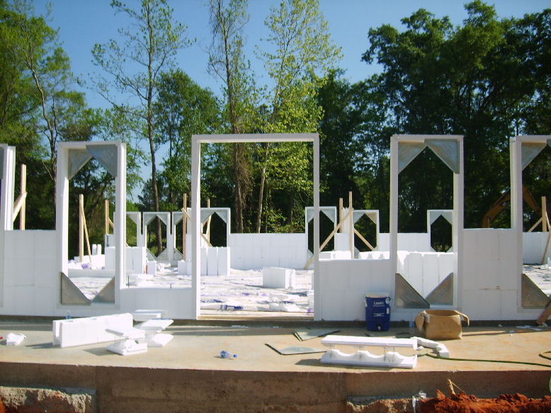 Partially completed ICF walls with window and door bucks