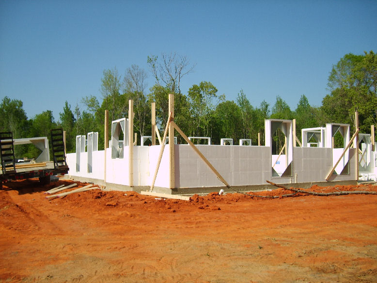 Partially completed ICF walls with corner braces